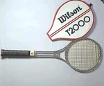 Vintage Wilson T2000 Tennis Racket Chrome. Fixed Price $29.99.